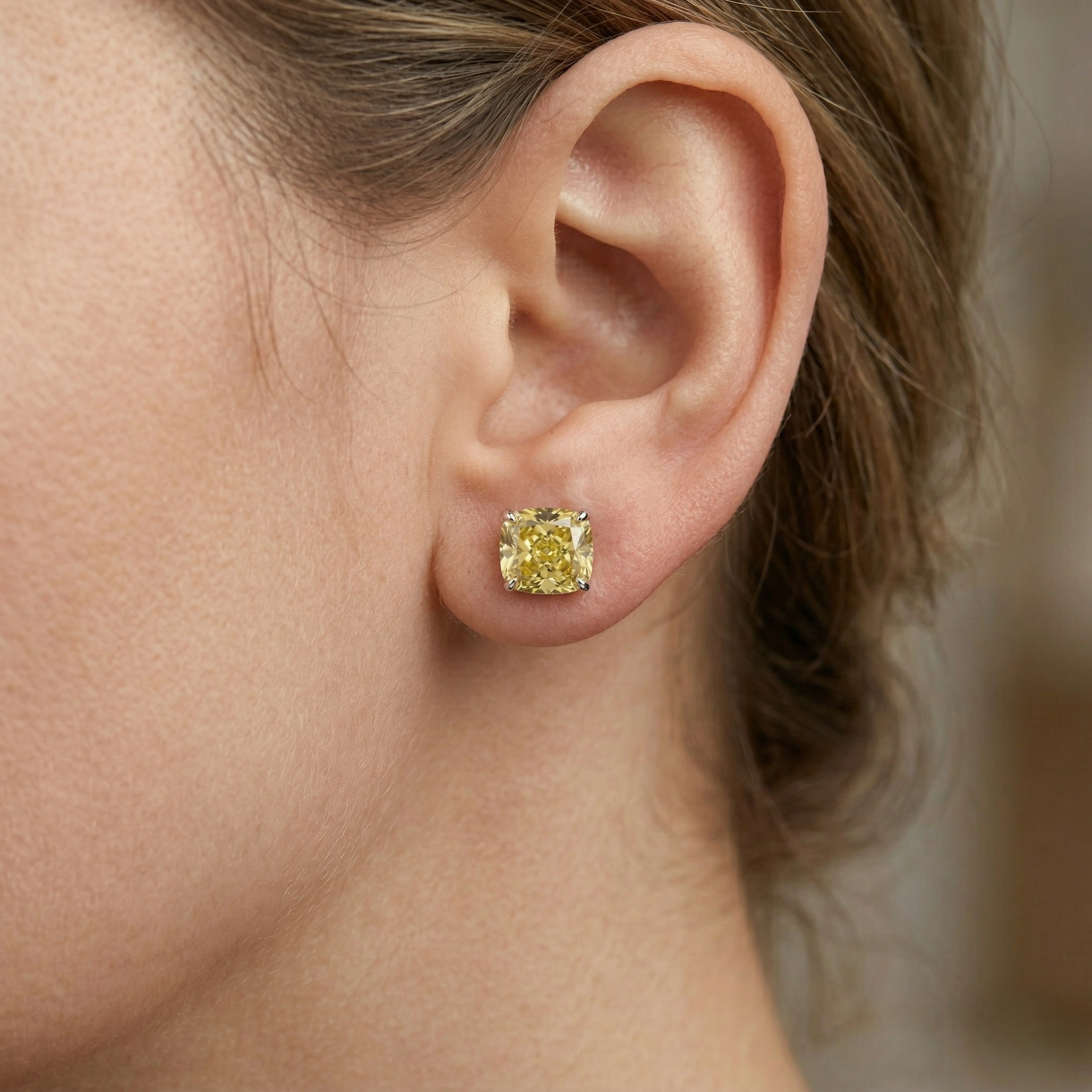 Fancy Yellow Cushion Cut Diamond Stud Earrings | Platinum 950 view 6