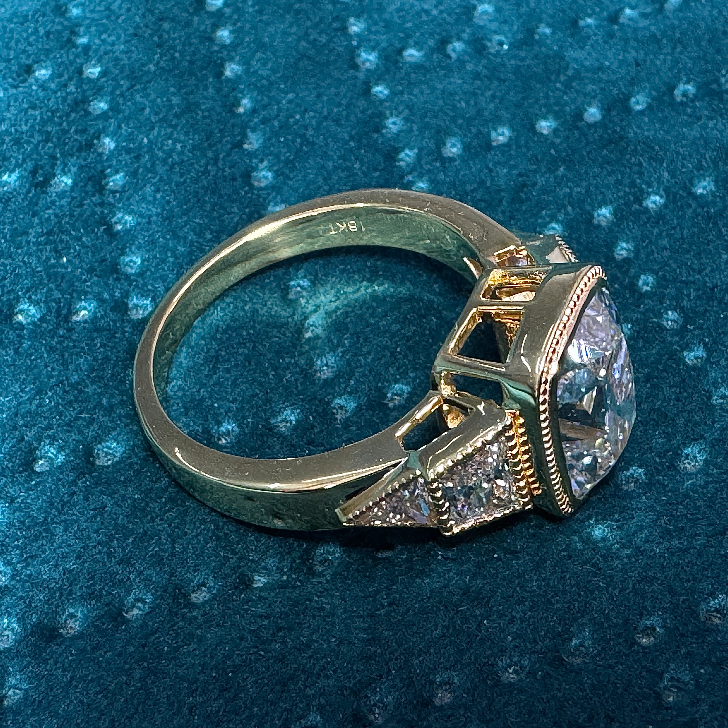 Elegant 5.74 CT Cushion Cut Diamond Ring in 18 KT Yellow Gold with Triangle & Trapezoid Accents view 5
