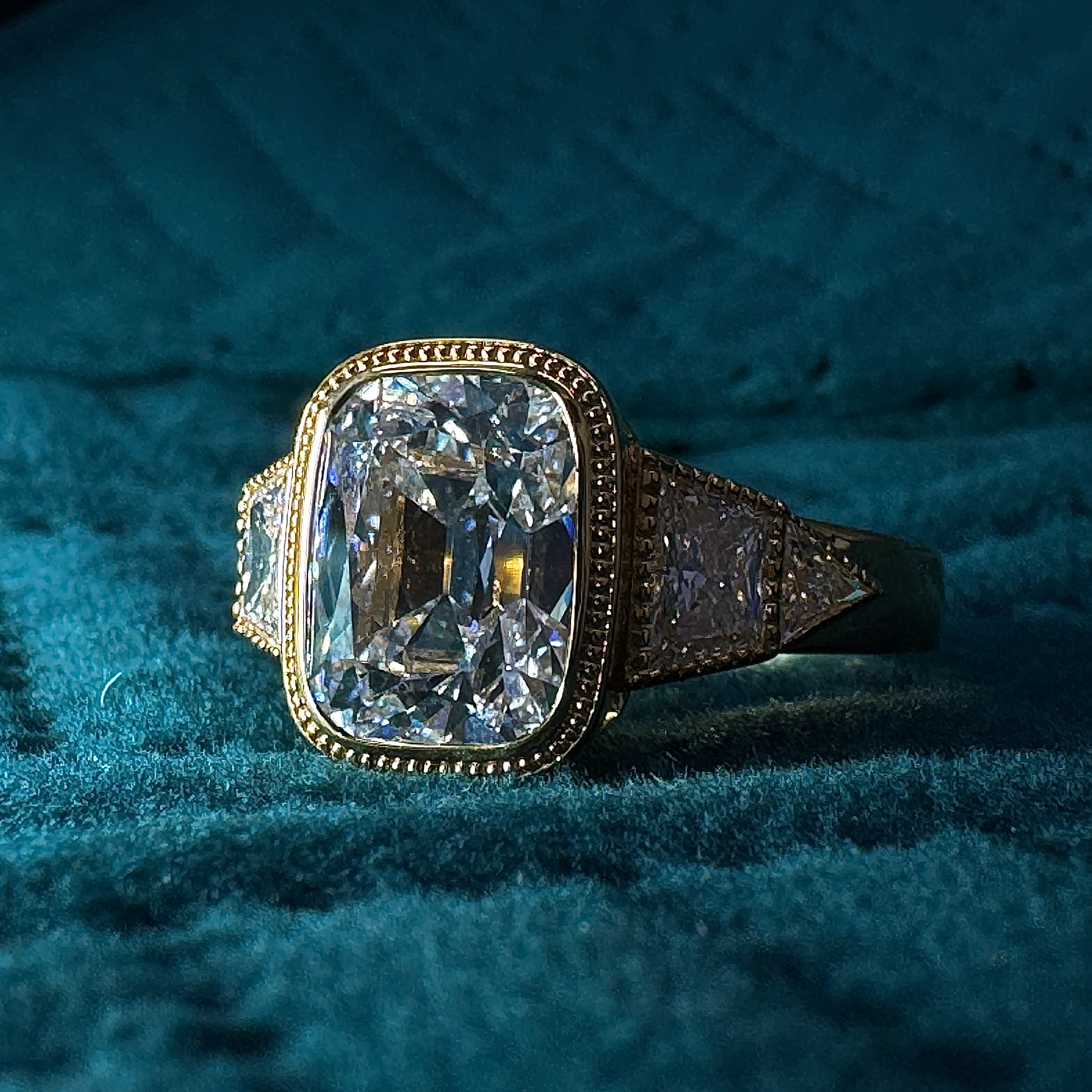Elegant 5.74 CT Cushion Cut Diamond Ring in 18 KT Yellow Gold with Triangle & Trapezoid Accents view 6