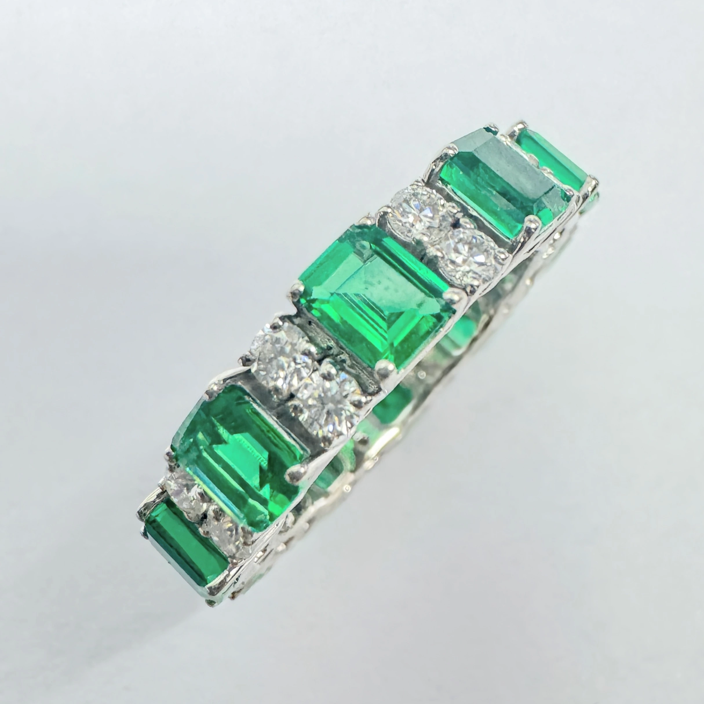 Emerald Cut Green & Round Lab Grown Diamond Eternity Band in Platinum view 6