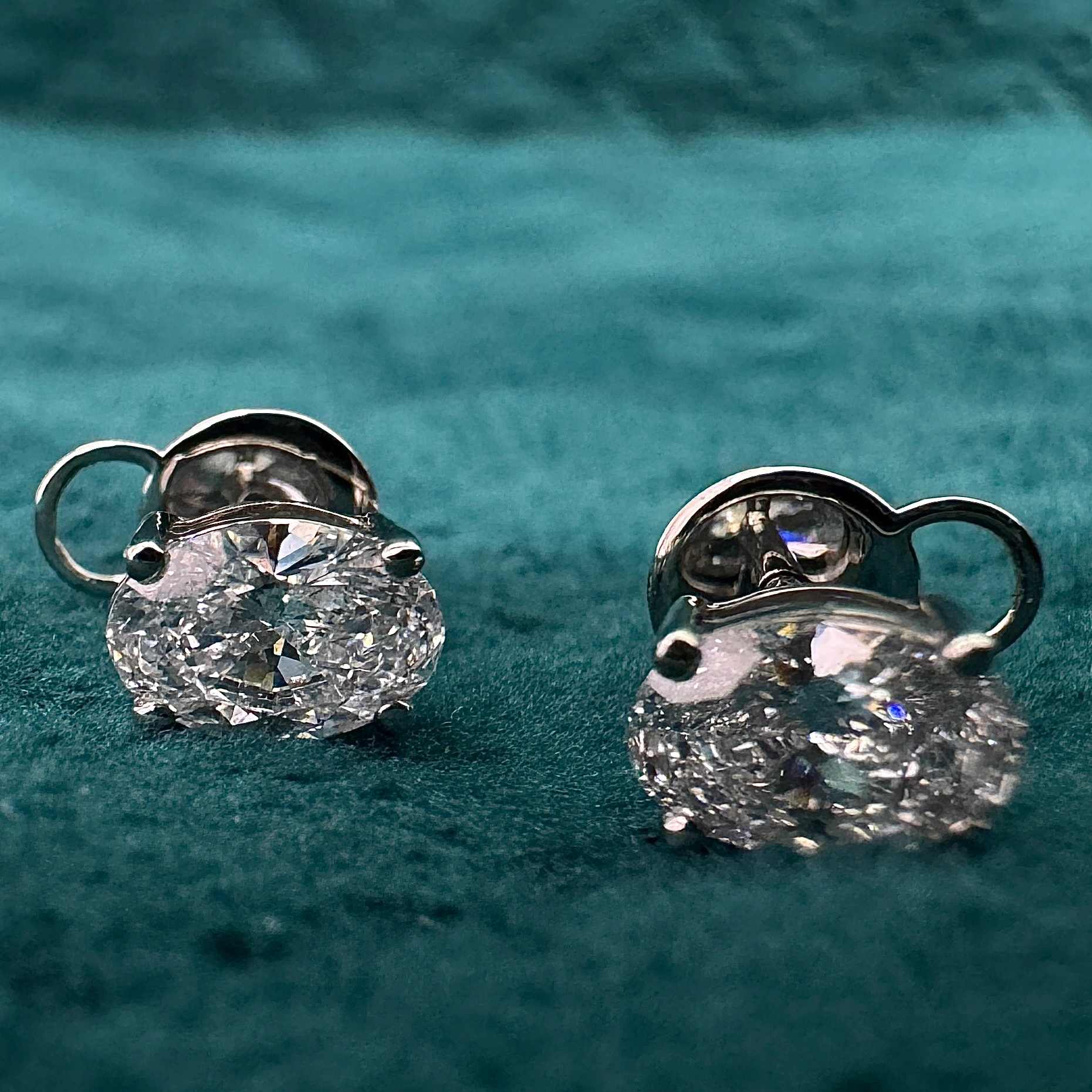 Exquisite 3.00 CT Total Lab Grown Diamond Earrings featuring Pear & Round Brilliant cuts for exceptional sparkle and elegance