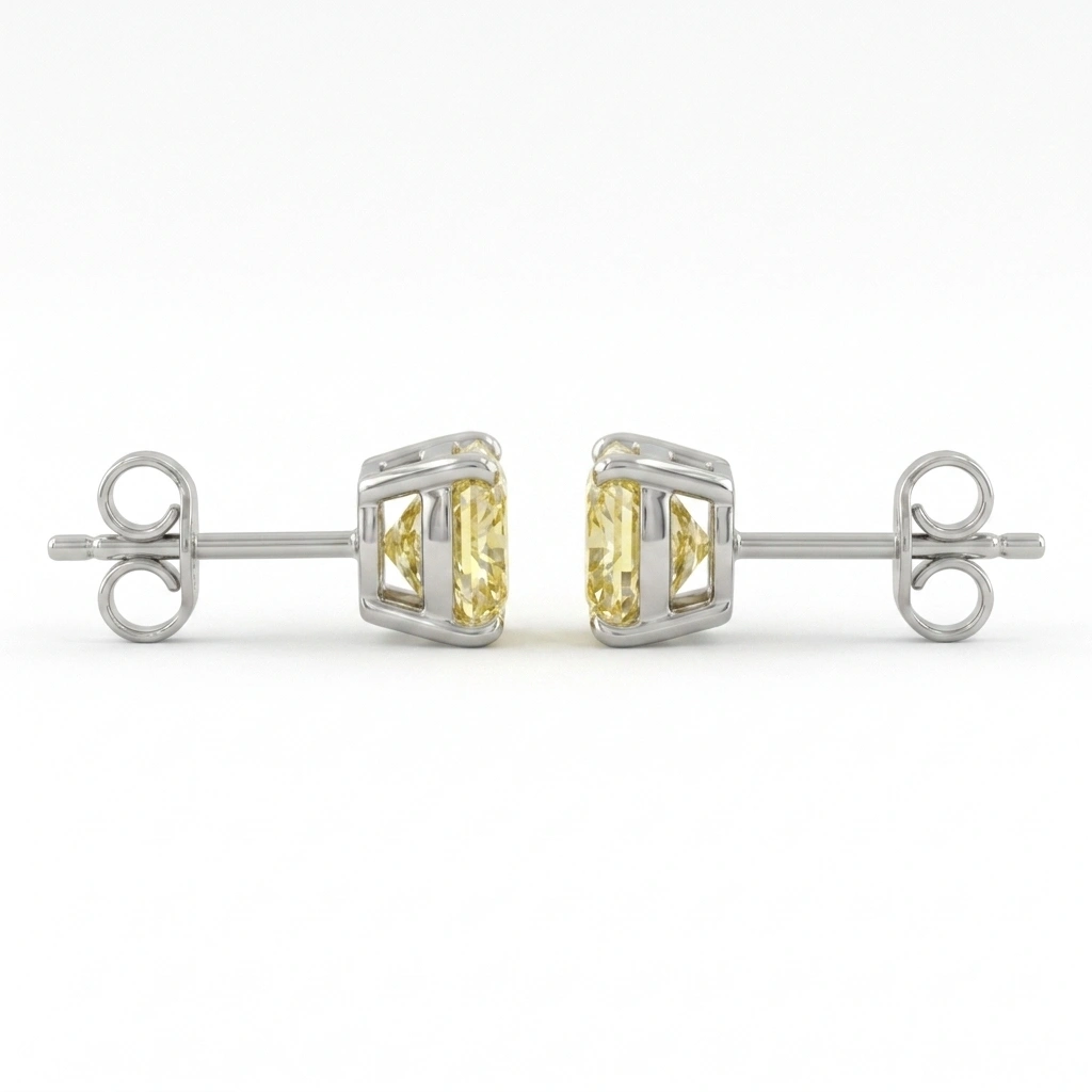 Fancy Yellow Cushion Cut Diamond Stud Earrings | Platinum 950 view 5