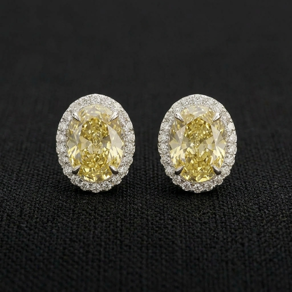 Fancy Yellow Oval Diamond Halo Stud Earrings in 14K White Gold