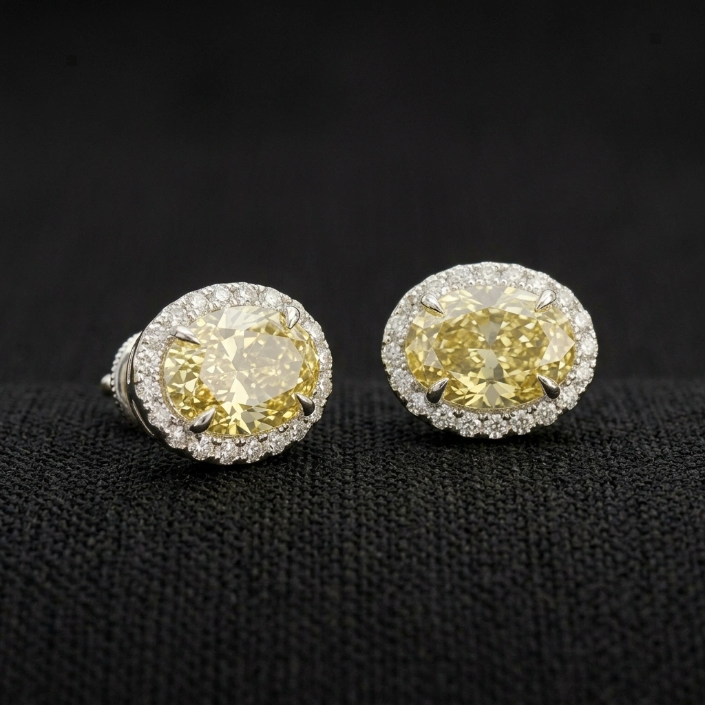 Fancy Yellow Oval Diamond Halo Stud Earrings in 14K White Gold view 3