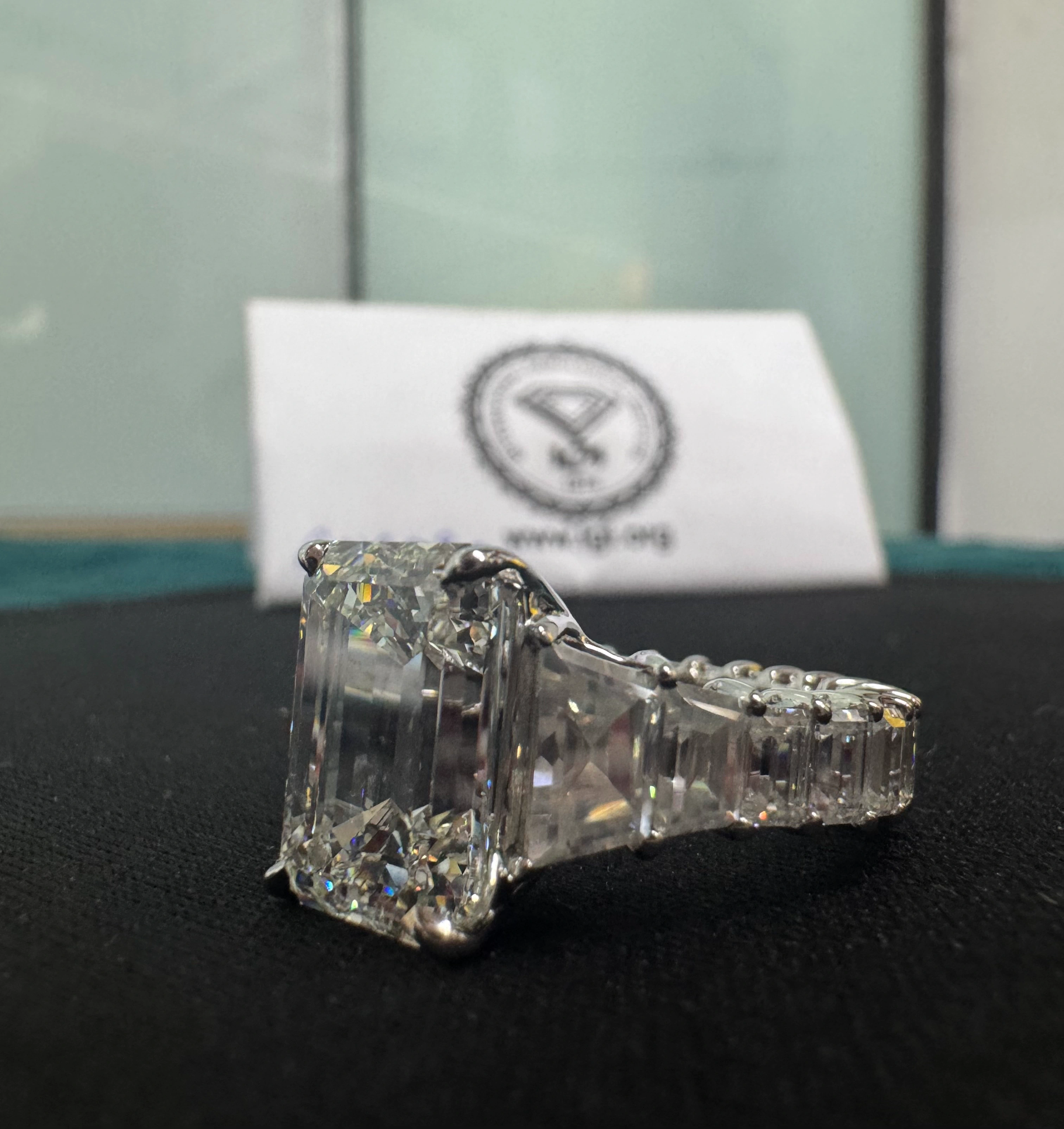 PT950 Platinum 11.72 CT Emerald Cut Diamond Engagement Ring | 6.5 CT Solitaire with Tapered Side Diamonds | IGI Certified view 7