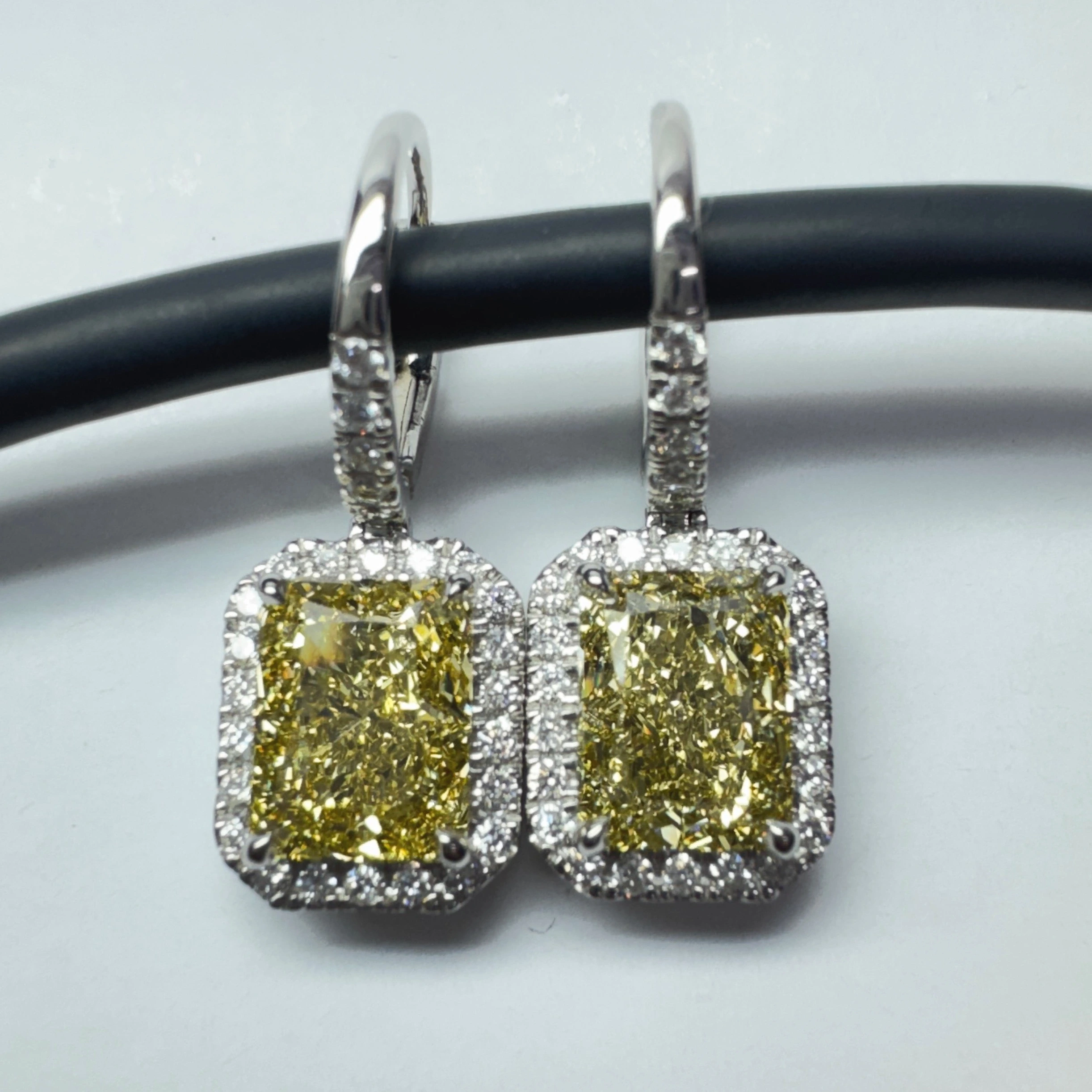Yellow Lab Grown Diamond Halo Earrings | IGI Certified view 6